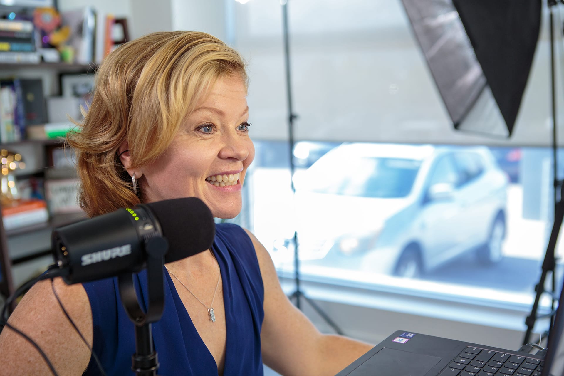 Gillian Stovel Rivers recording a podcast.